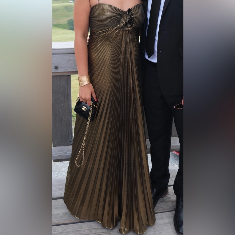 Mac Duggal Gold Metallic Pleated Gown with 3D Flower - Picture 2 of 4
